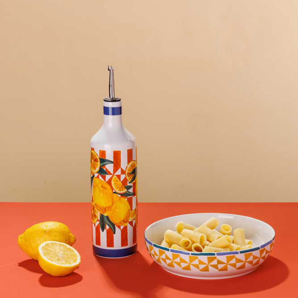 Porto Valentina Round Serving Bowl 32cm next to an oil bottle and lemons at MyHouse