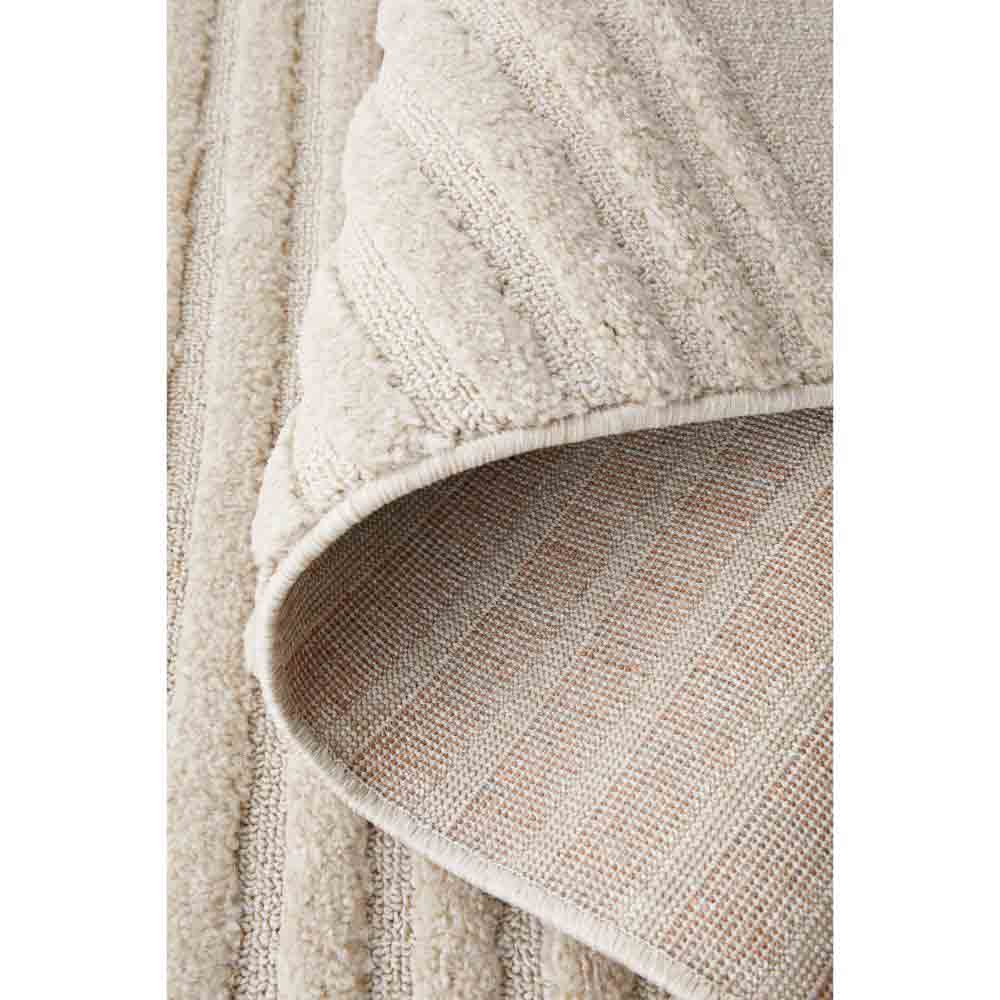 Rug Culture Lotus Abbey Rug in Beige at MyHouse. Detail shot of Rug with arch detail.