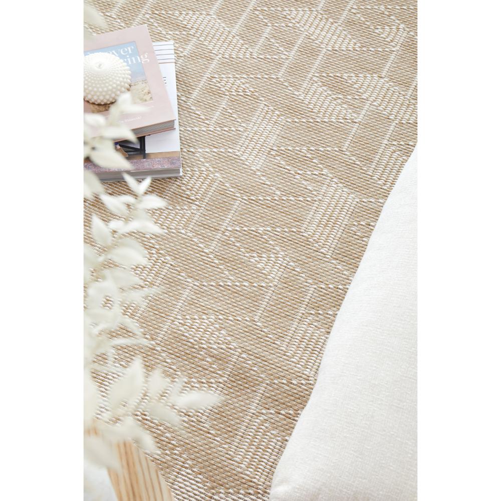 Indoor/outdoor natural weave look rug with books - MyHouse