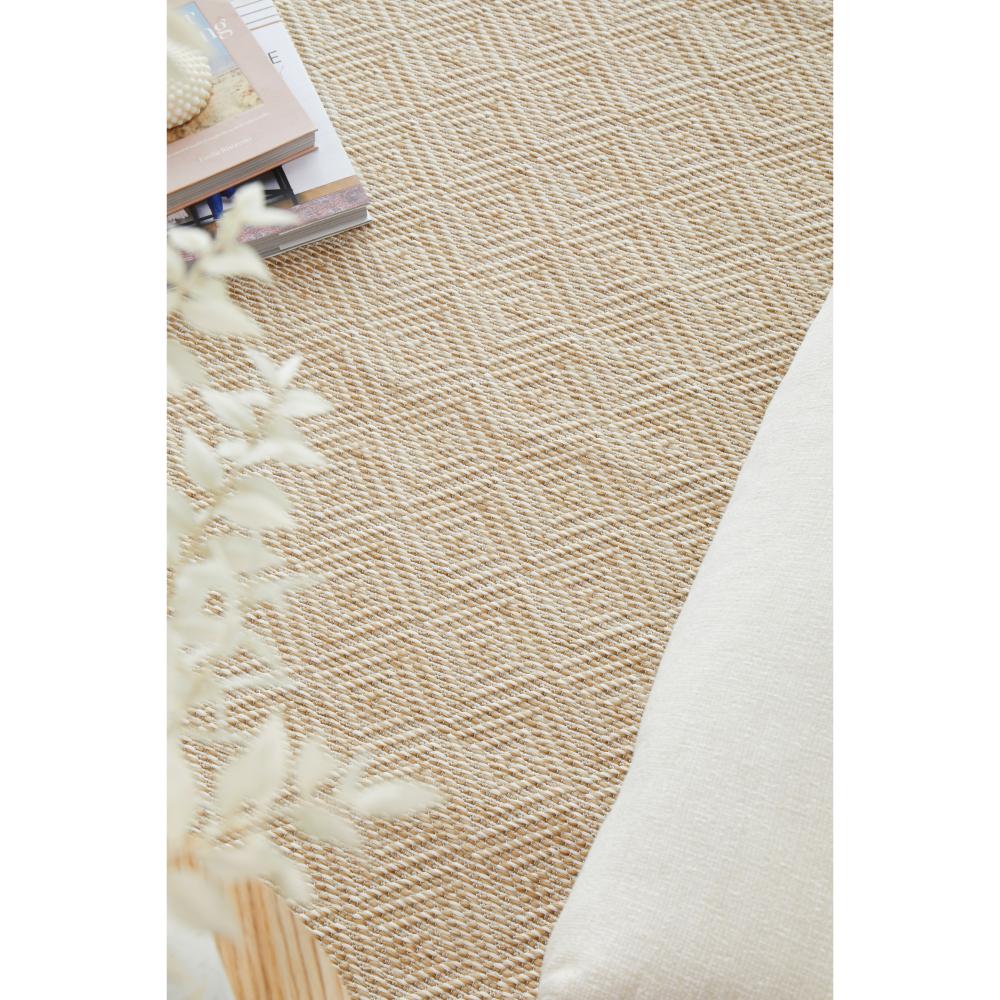 Beige diamond design Indoor/Outdoor rug with stack of books - MyHouse