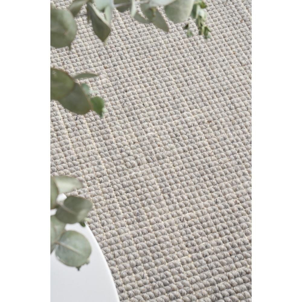 cream hamptons style jute wool rug with native green foliage- MyHouse