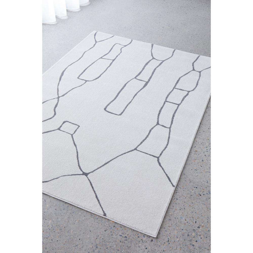 grey printed modern abstract rug by the window - MyHouse