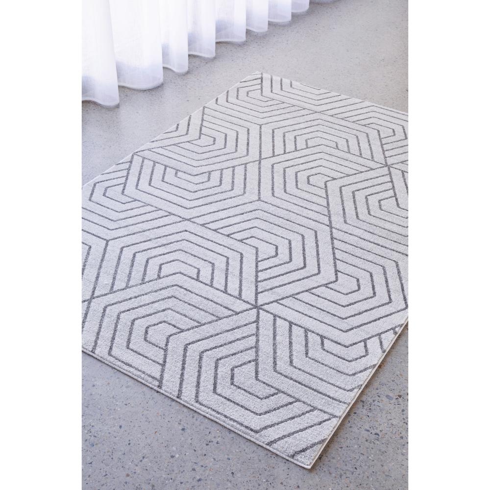 grey modern rug with art deco design by the window - MyHouse