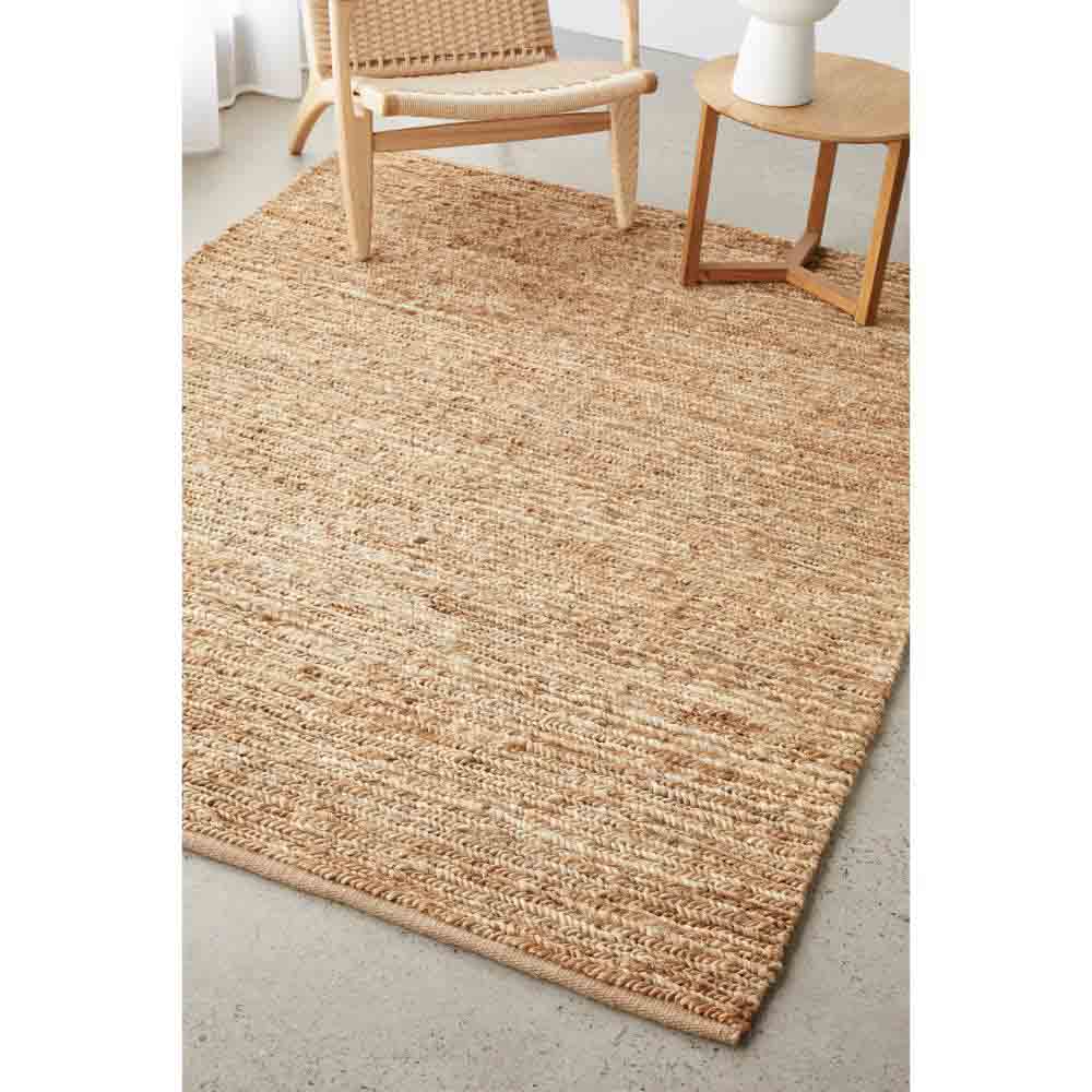 natural brown beige jute rug with armchair and table - MyHouse