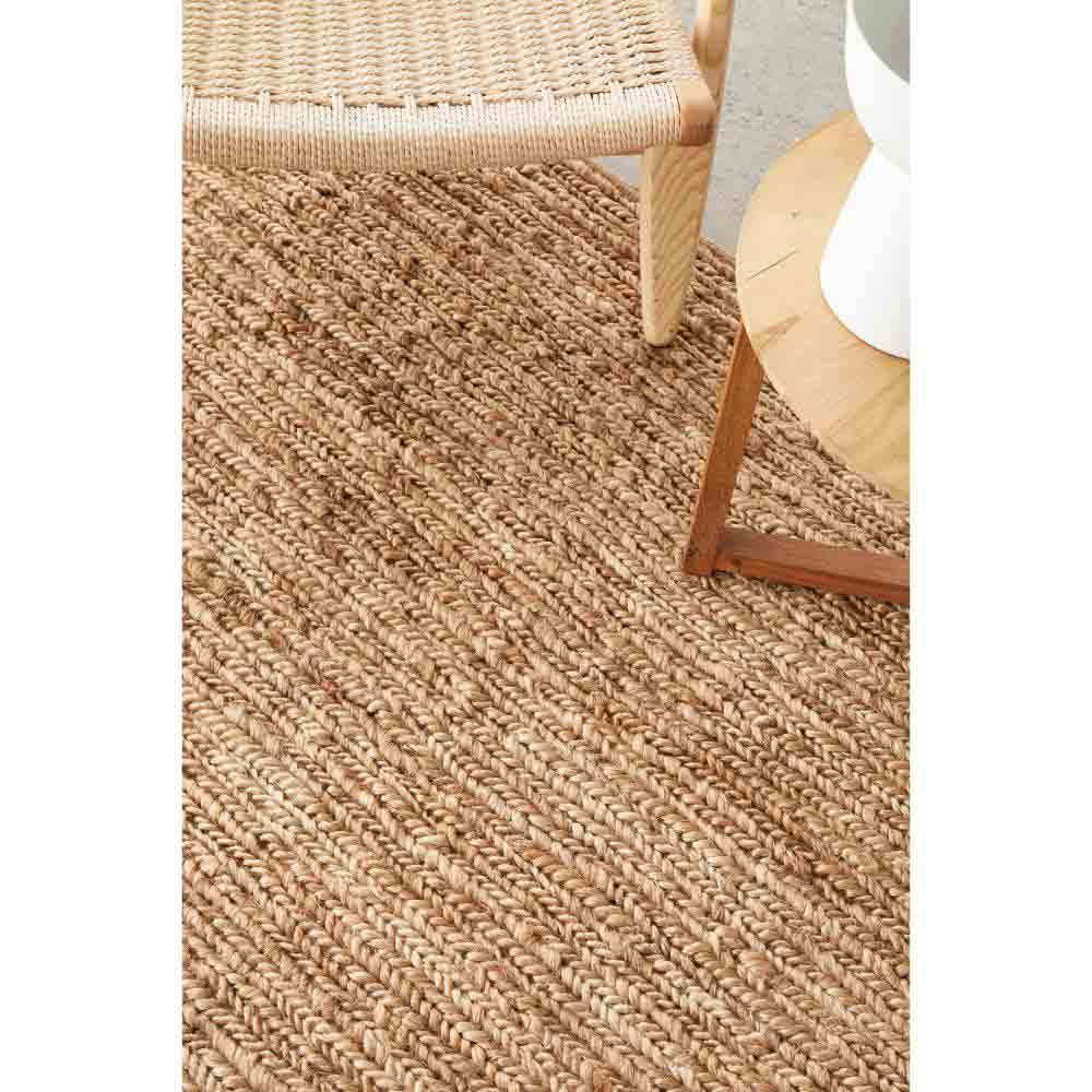 natural brown beige jute rug with armchair and table - MyHouse
