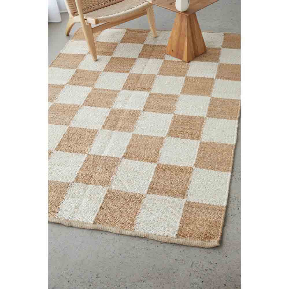 warm beige checkboard jute rug with armchair - MyHouse