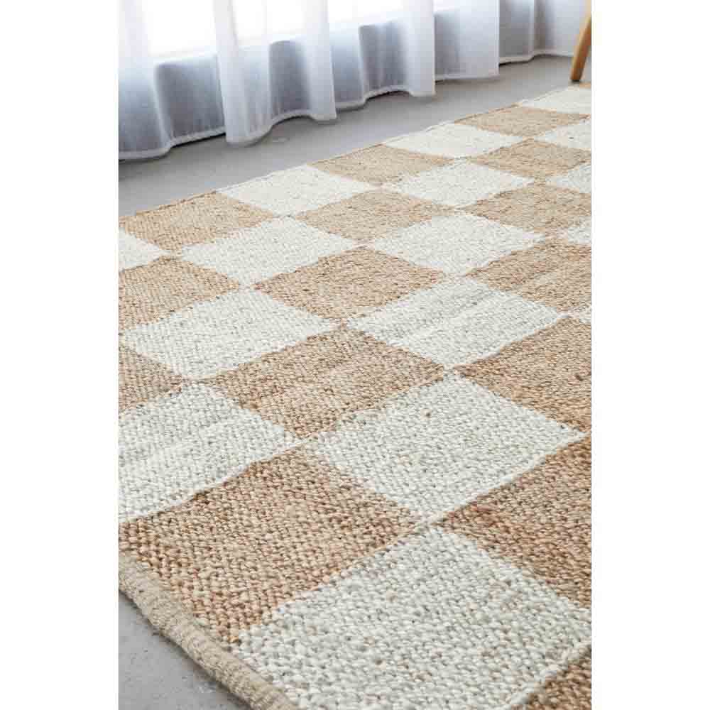 warm beige checkerboard jute rug by the window - MyHouse