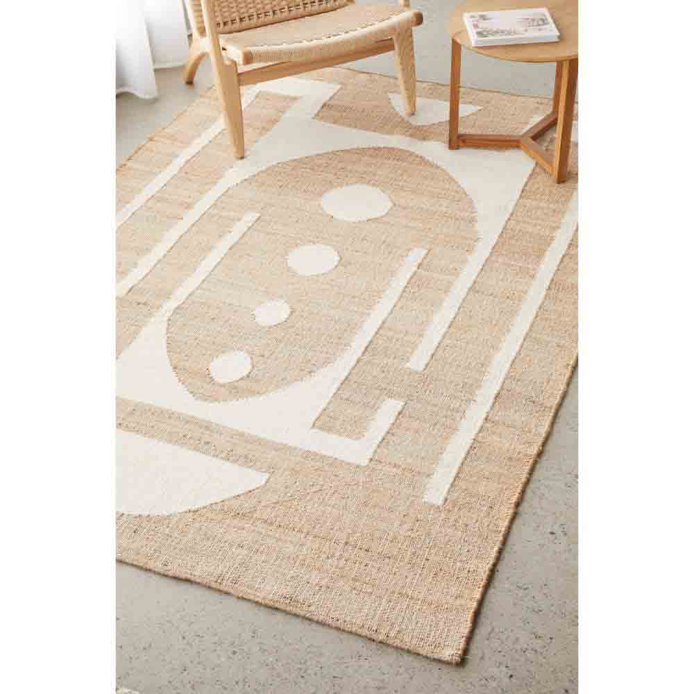 Natural beige wool jute bohemian rug with armchair and table - MyHouse