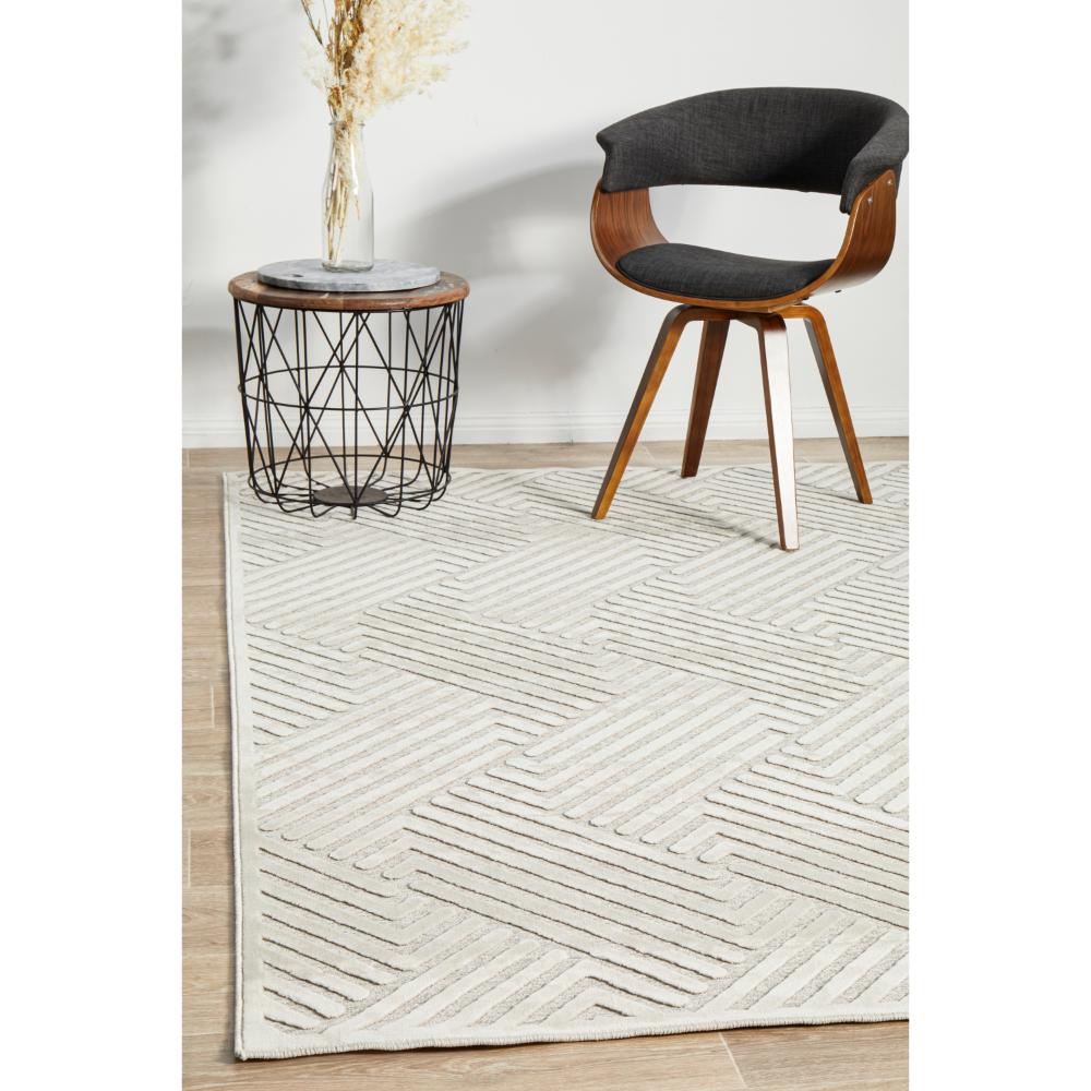 natural beige chevron rug with armchair and side table - MyHouse
