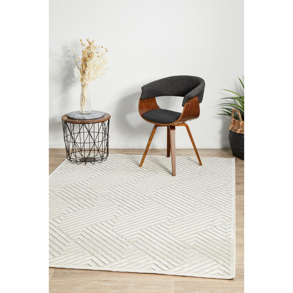 natural beige chevron rug with armchair and side table - MyHouse
