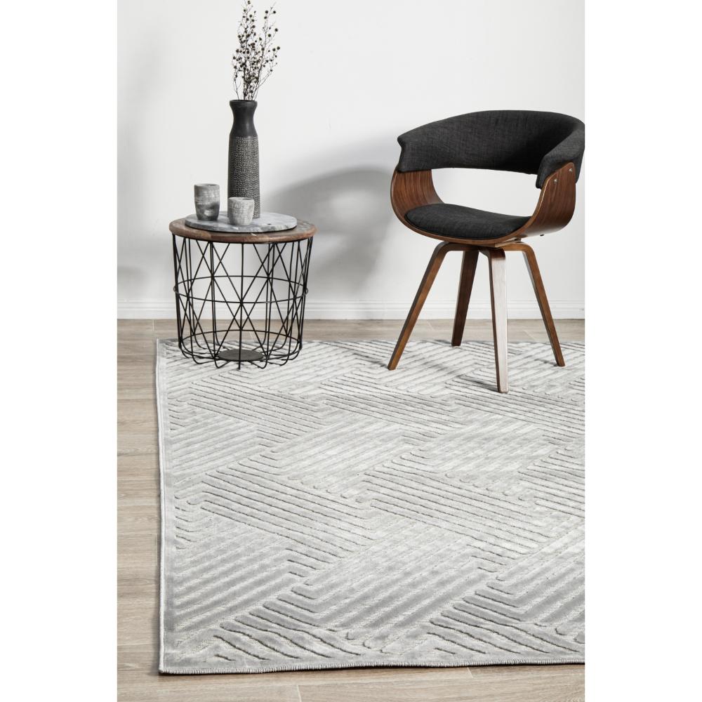 silver grey chevron rug with armchair and side table - MyHouse