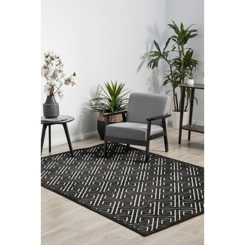 black and beige geometric swirl rug in sitting room - MyHouse