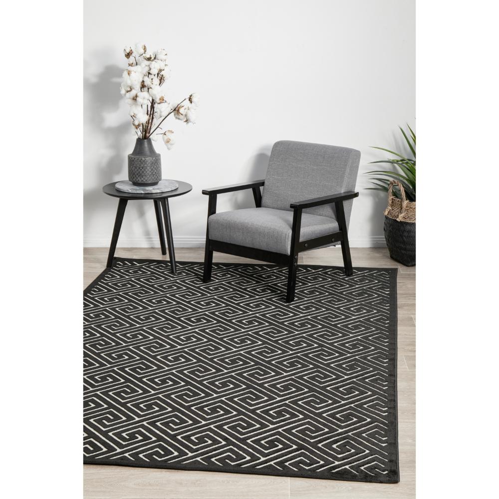 black and beige geometric swirl rug in sitting room - MyHouse