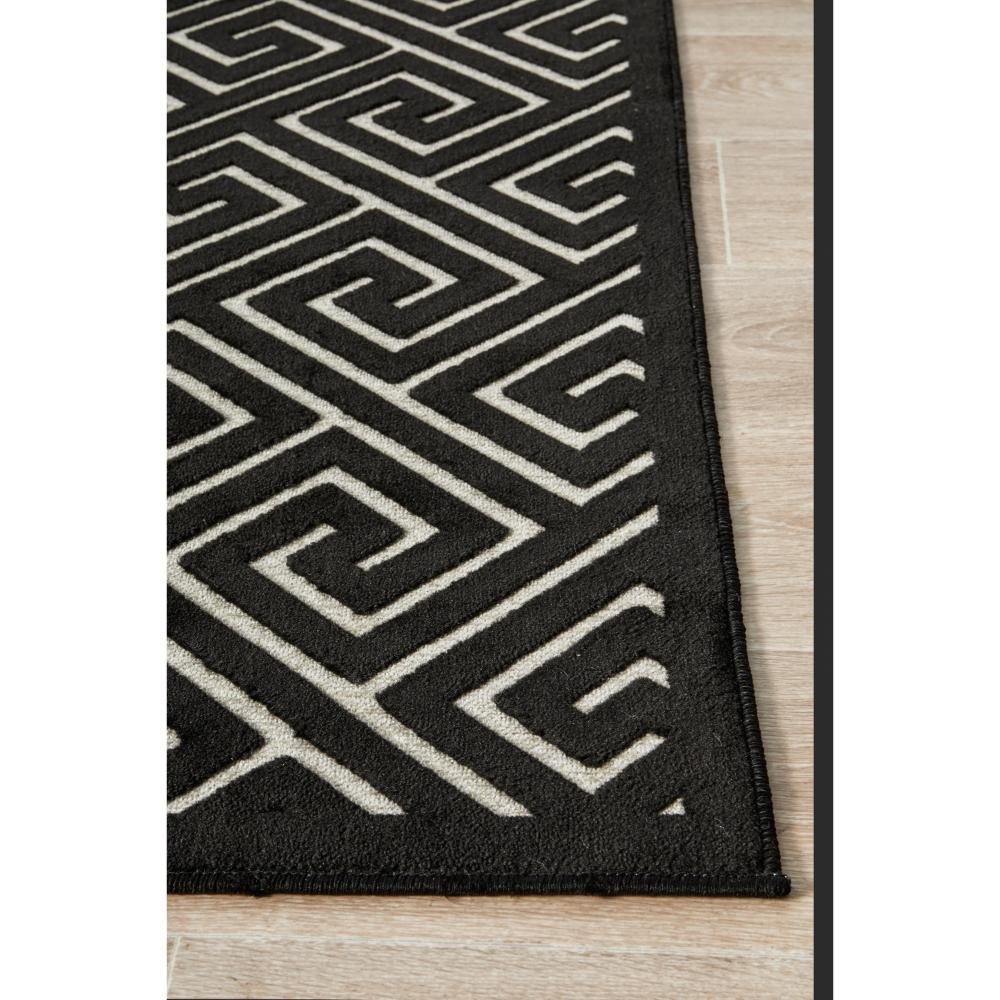 black and gold geometric swirl rug detail image - MyHouse
