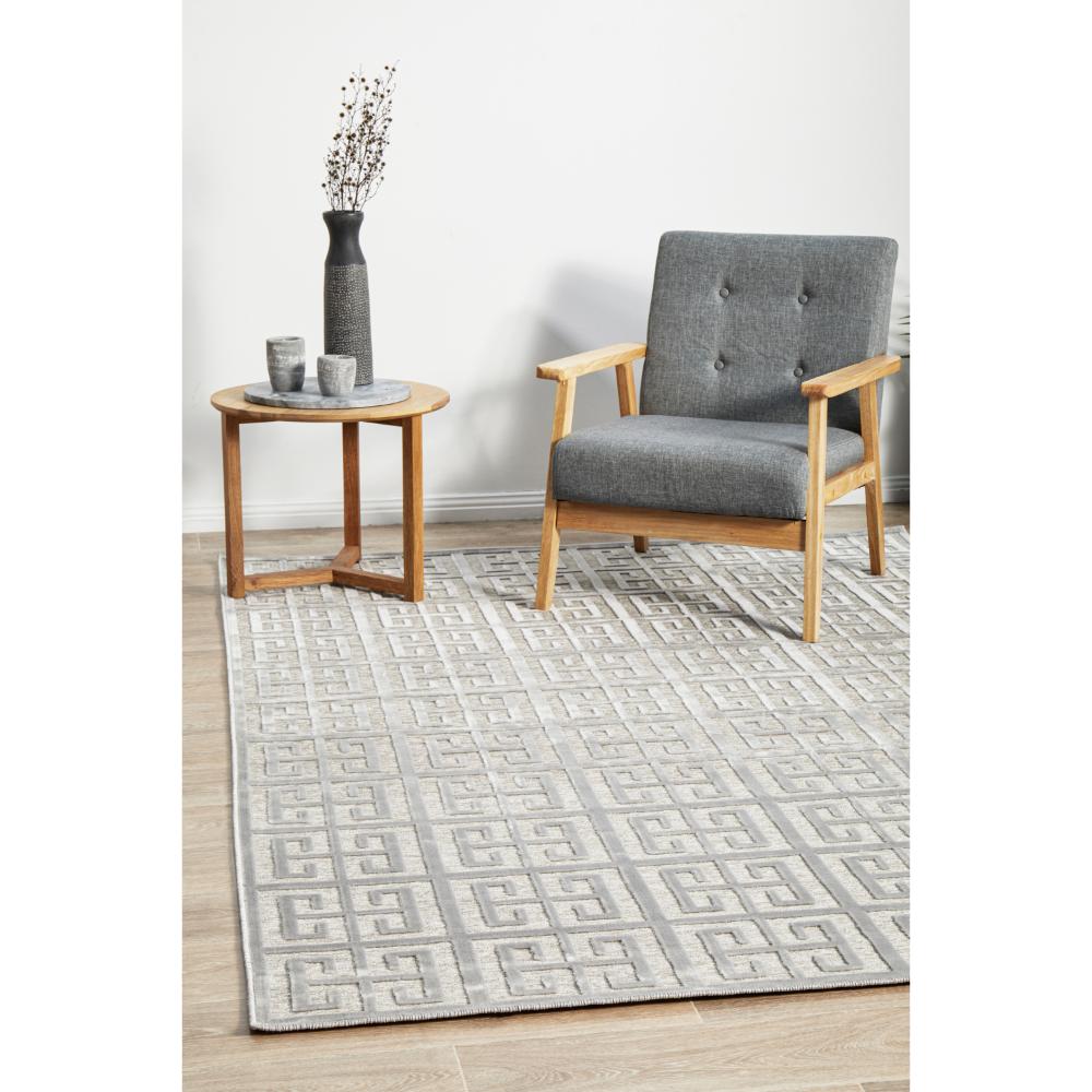 silver grey art deco tile rug with armchair and table - MyHouse