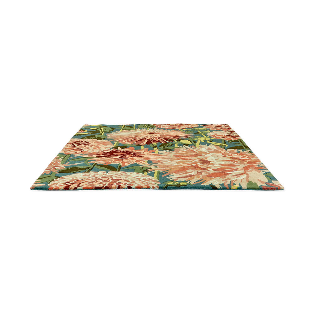 designer large orange dahlia flower wool rug angled shot - MyHouse
