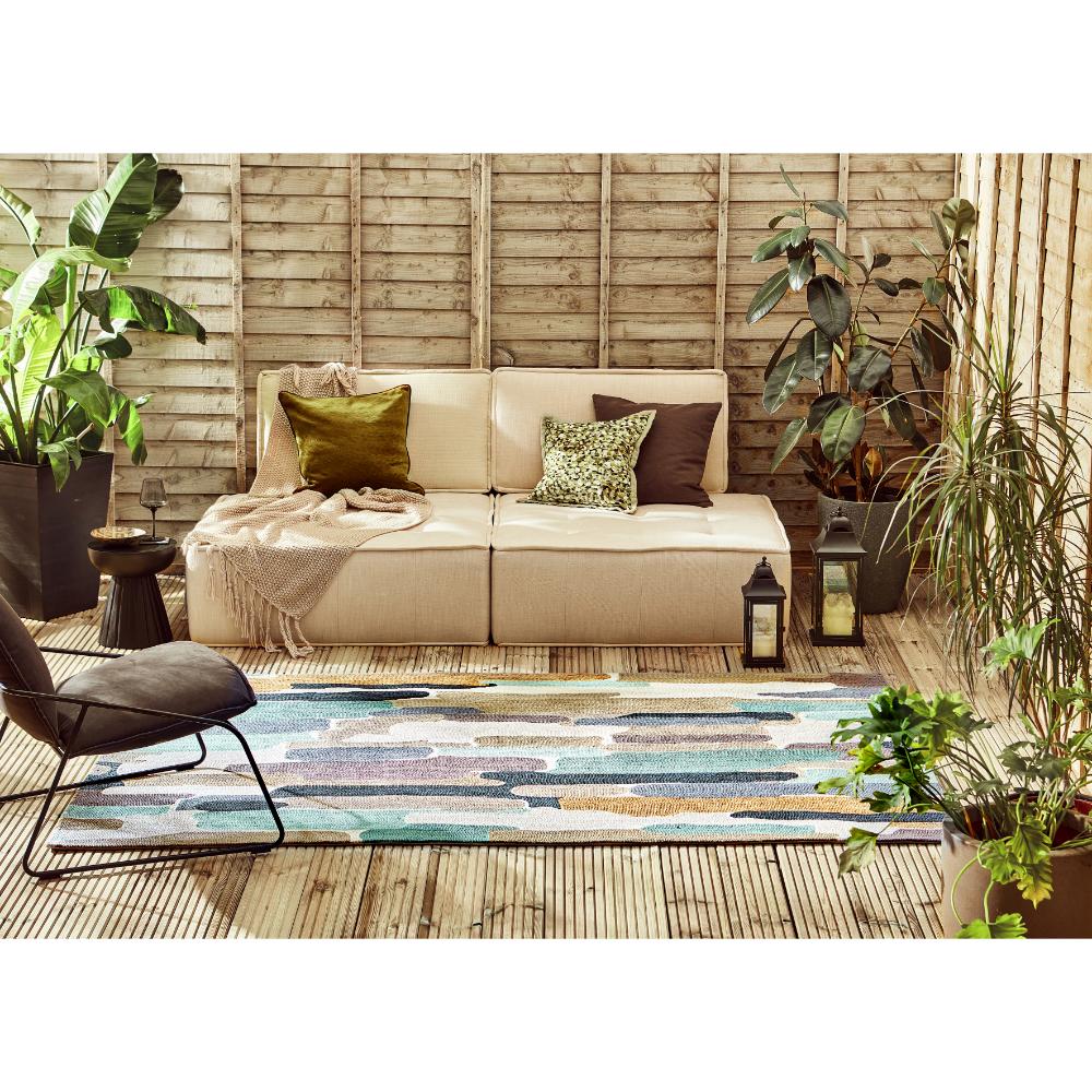 Blue Green Indoor/Outdoor Rug in outdoor seating area - MyHouse