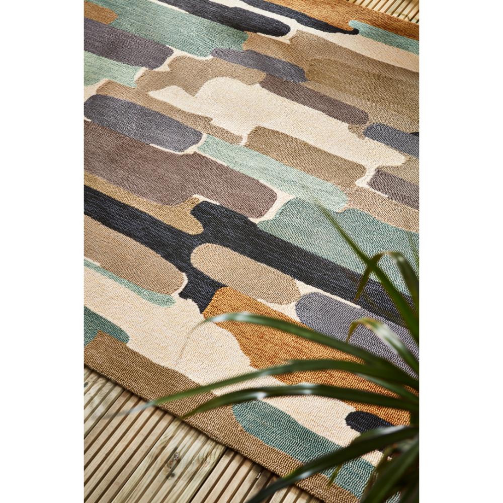 Blue Green Indoor/Outdoor Rug on a patio - MyHouse