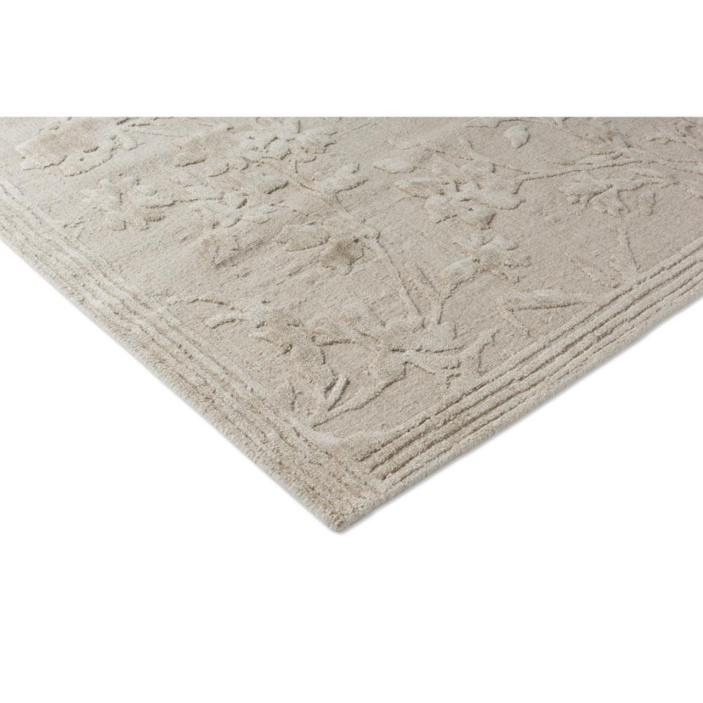 natural beige flower embossed rug detail image - MyHouse