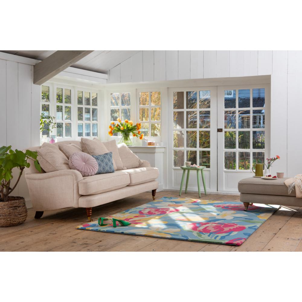 Tulips wool rug in sunroom with couch - MyHouse