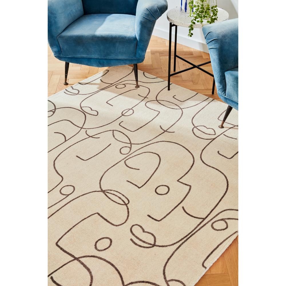 abstract face design Wool Rug with blue armchairs - MyHouse