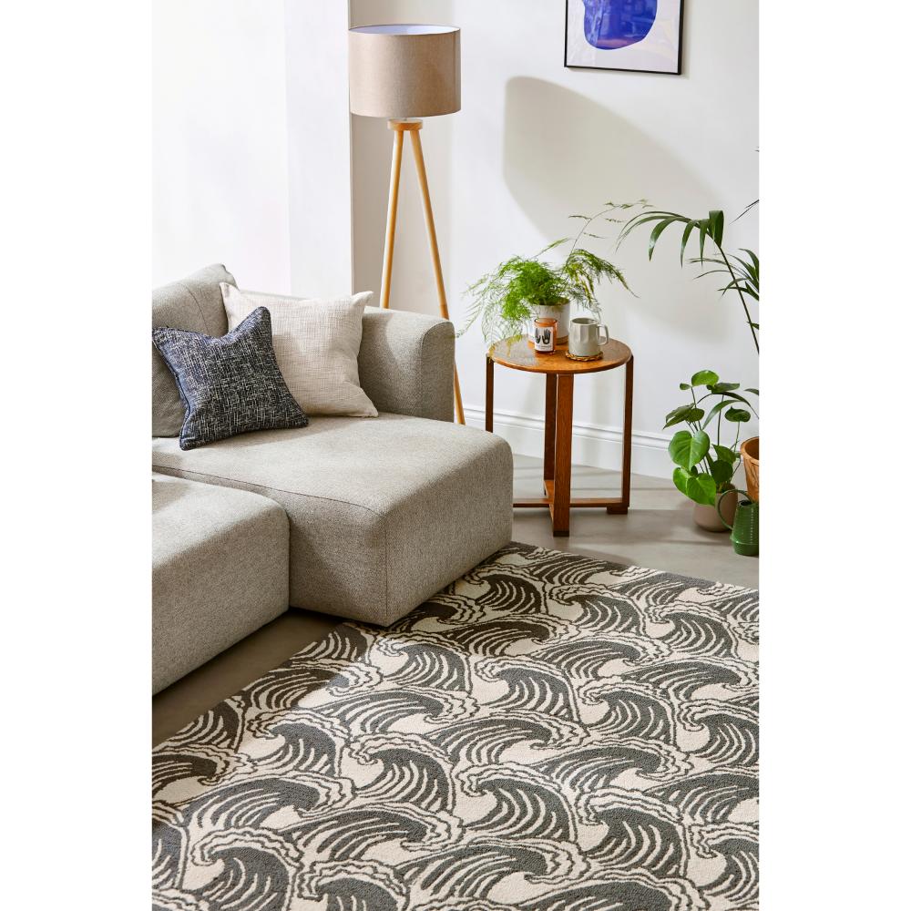 grey wave print wool rug in loungeroom with side table - MyHouse