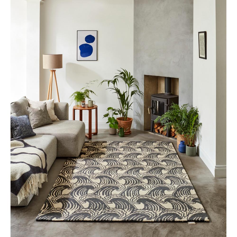grey wave print wool rug in loungeroom with fireplace - MyHouse