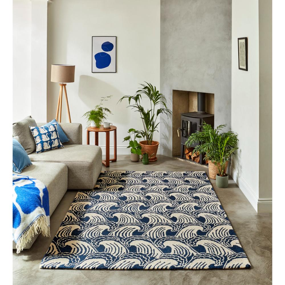 blue wave print wool rug in loungeroom with fireplace - MyHouse