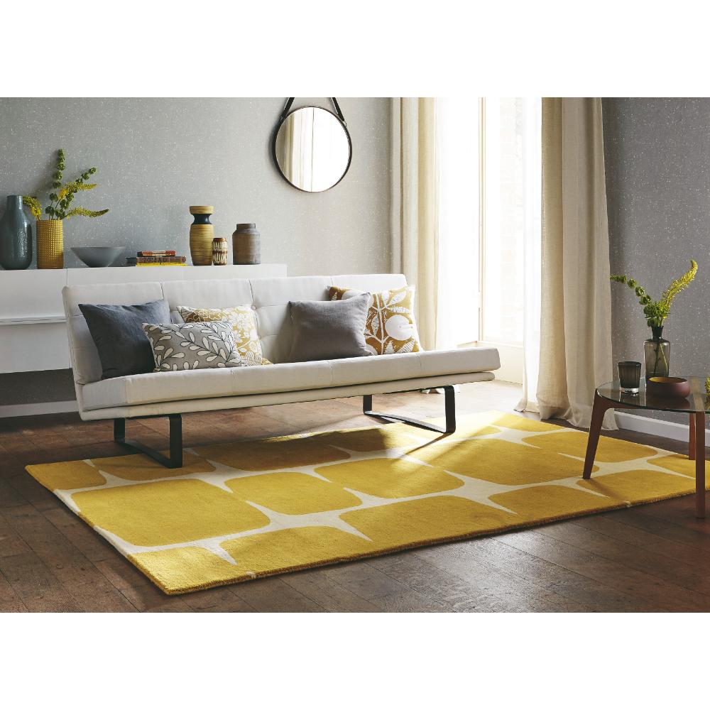 yellow honeycomb design wool rug in modern loungeroom - MyHouse