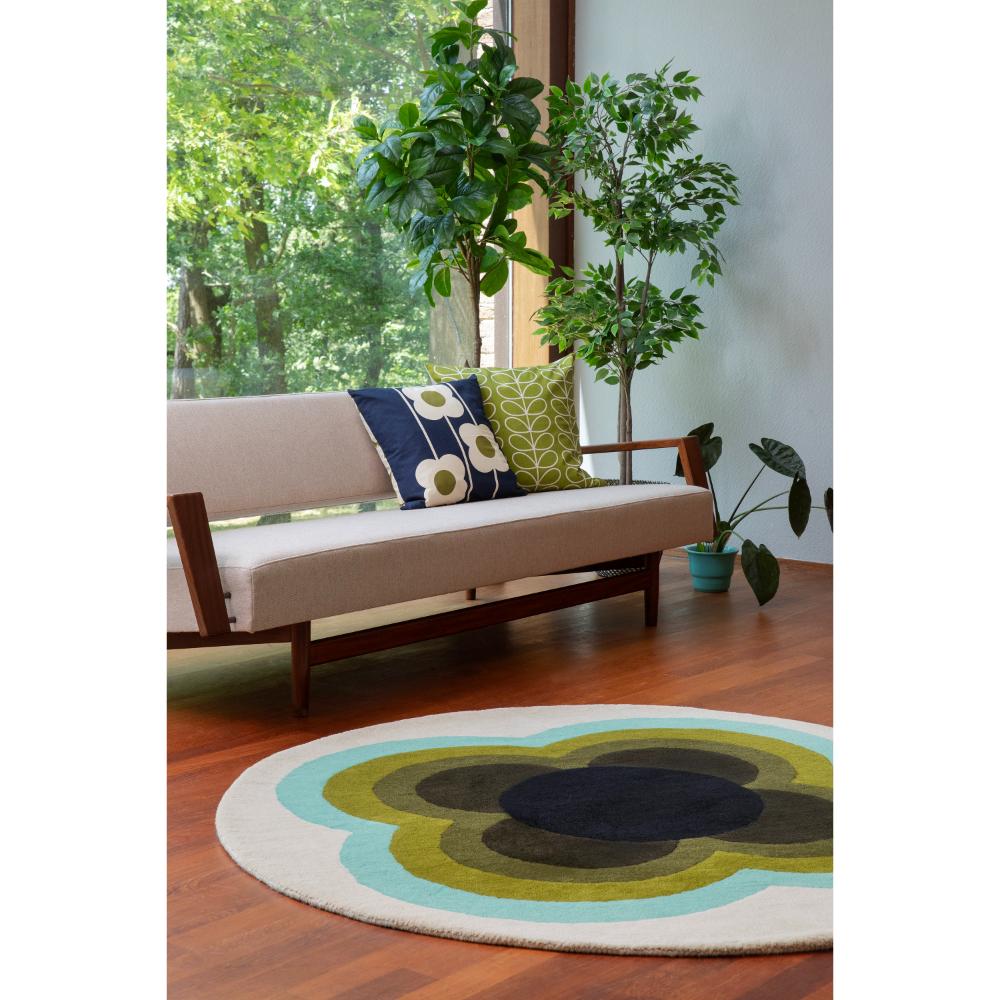 round green and blue flower rug in sunlit loungeroom - MyHouse