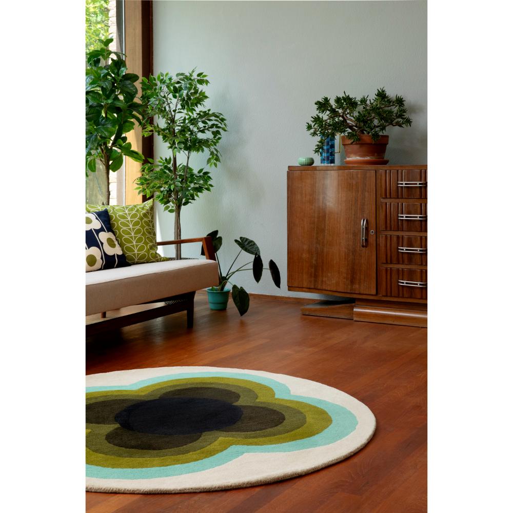 round green and blue flower rug in sunlit loungeroom - MyHouse