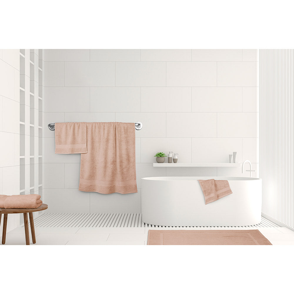Algodon St Regis Bath Towels Dusk pink at MyHouse. Bath towel, bath sheet, bath mat, hand towel and facewasher displayed in a bathroom