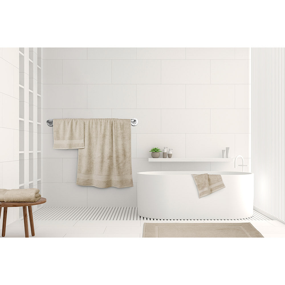 Algodon St Regis Bath Towels Stone cream at MyHouse. Bath towel, bath sheet, bath mat, hand towel and facewasher displayed in a bathroom