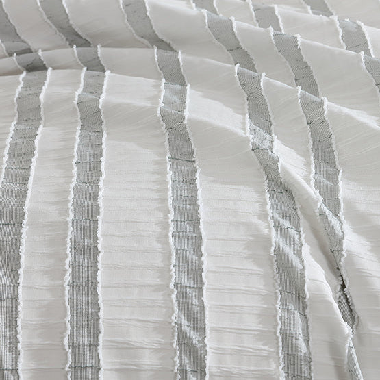 Textured fabric with horizontal stripes on a white background