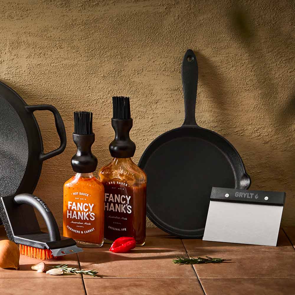 cast iron pans and stainless steel utensils for outdoor cooking - MyHouse