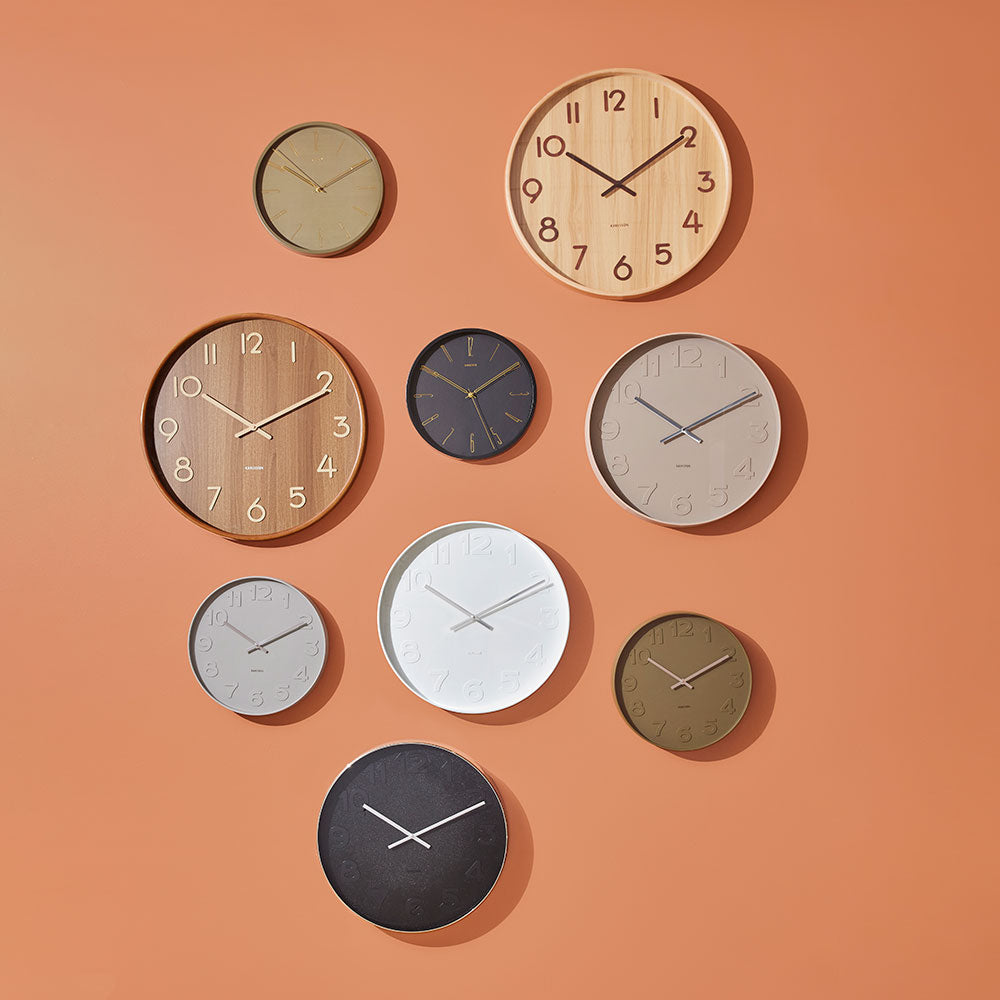 Karlsson Wall Clocks AW25 displayed on a burnt orange wall - MyHouse