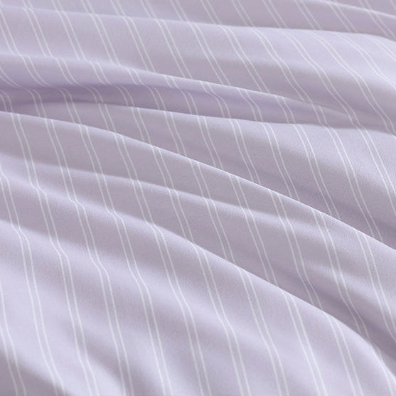 Close-up of a light purple fabric with subtle stripes