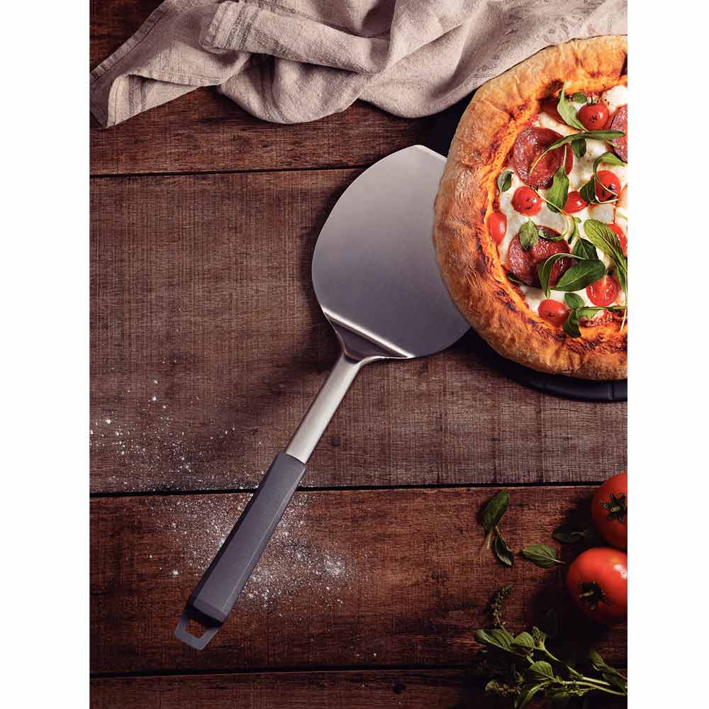 Tramontina Pizza Spatula - Paddle scooped under pizza - MyHouse