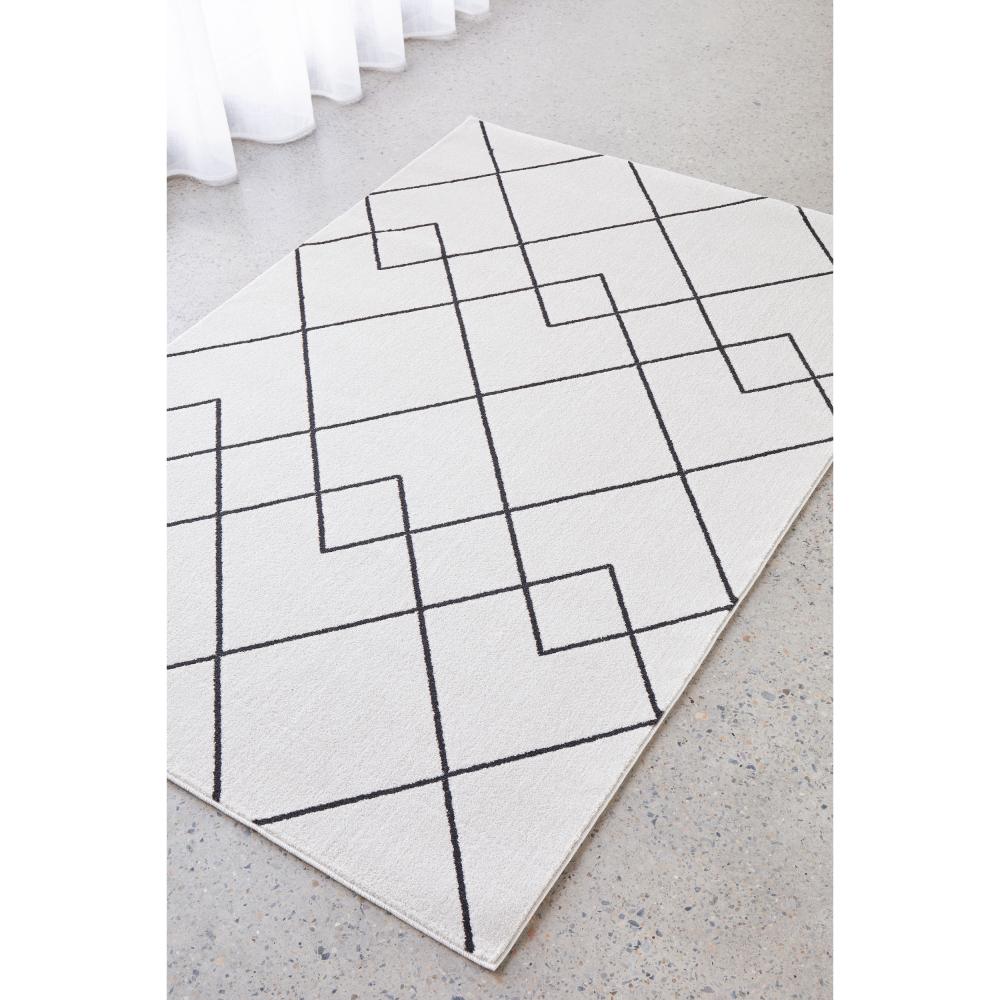 grey modern abstract rug by the window - MyHouse
