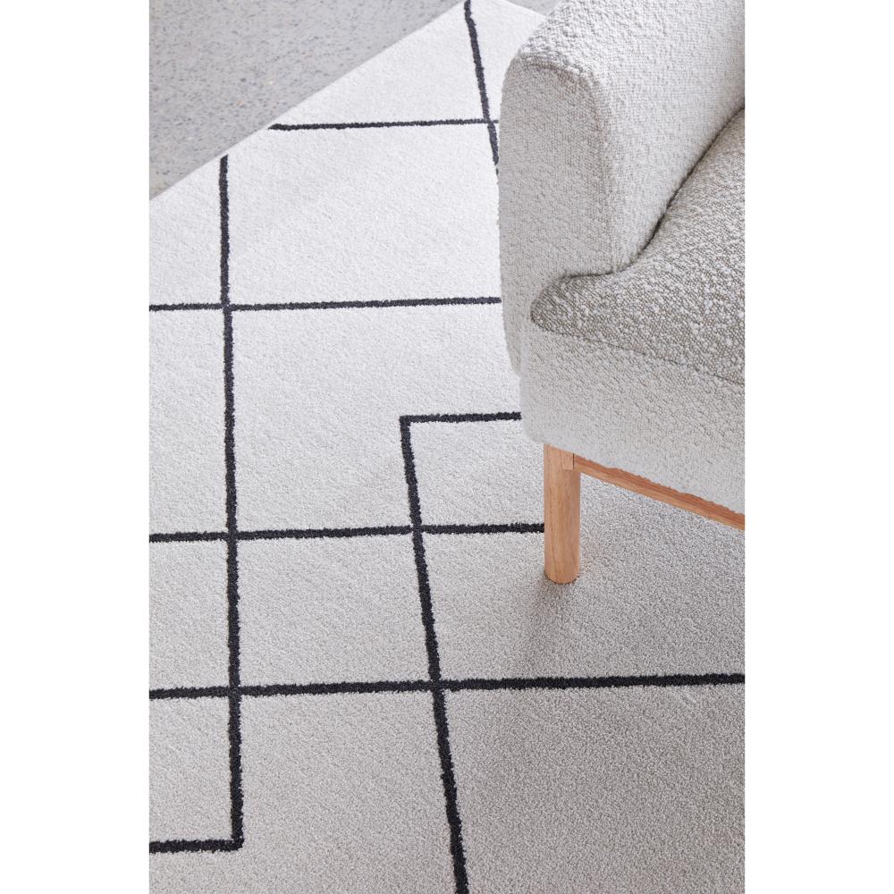 grey modern abstract rug with armchair - MyHouse