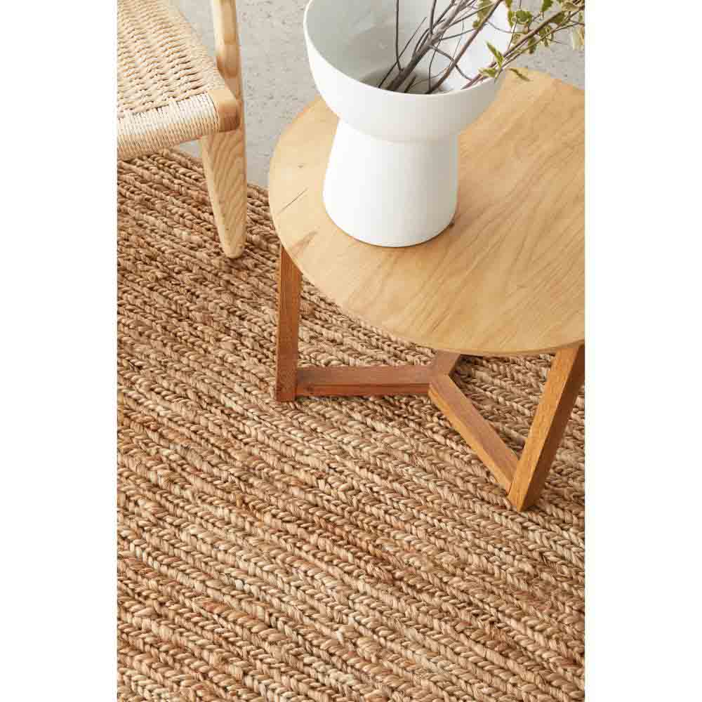 natural brown beige jute rug with armchair and table - MyHouse