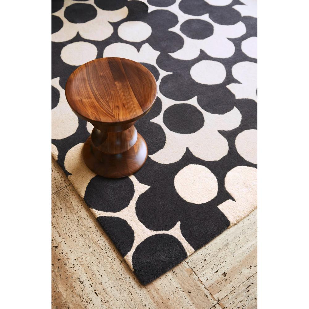 Grey and white flower rug with wooden stool - MyHouse