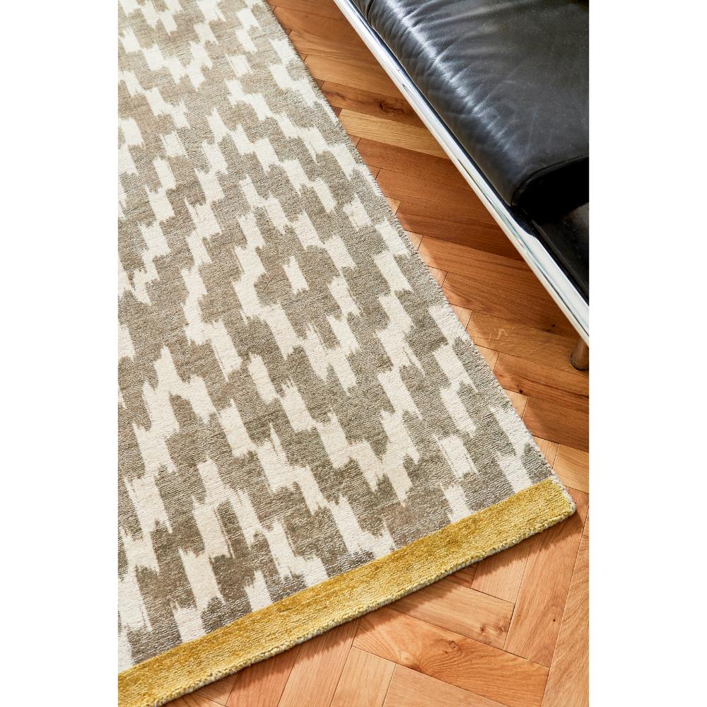 Grey geo diamond print Wool Rug with black lounge - MyHouse