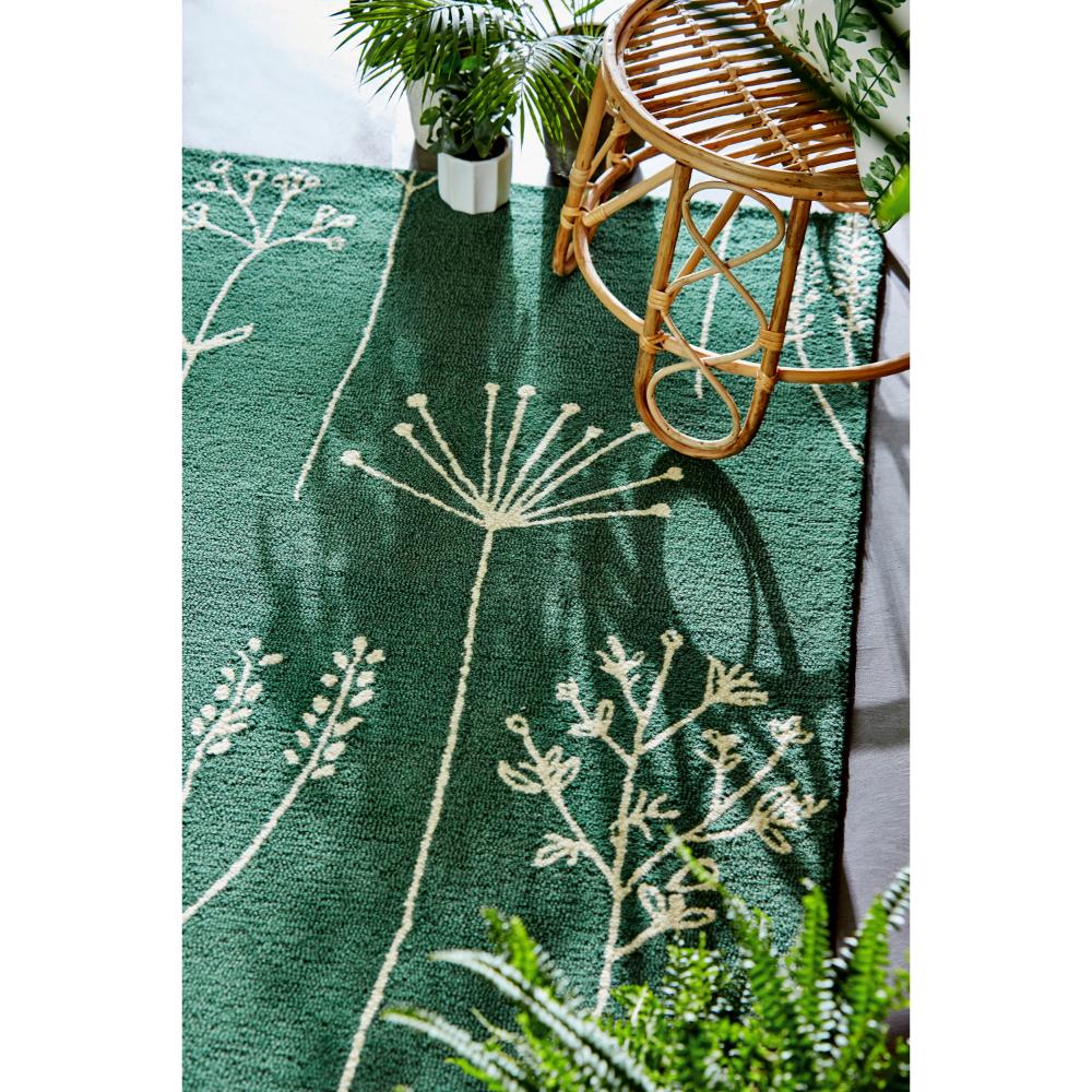 green flower stem wool rug with plants and stool - MyHouse