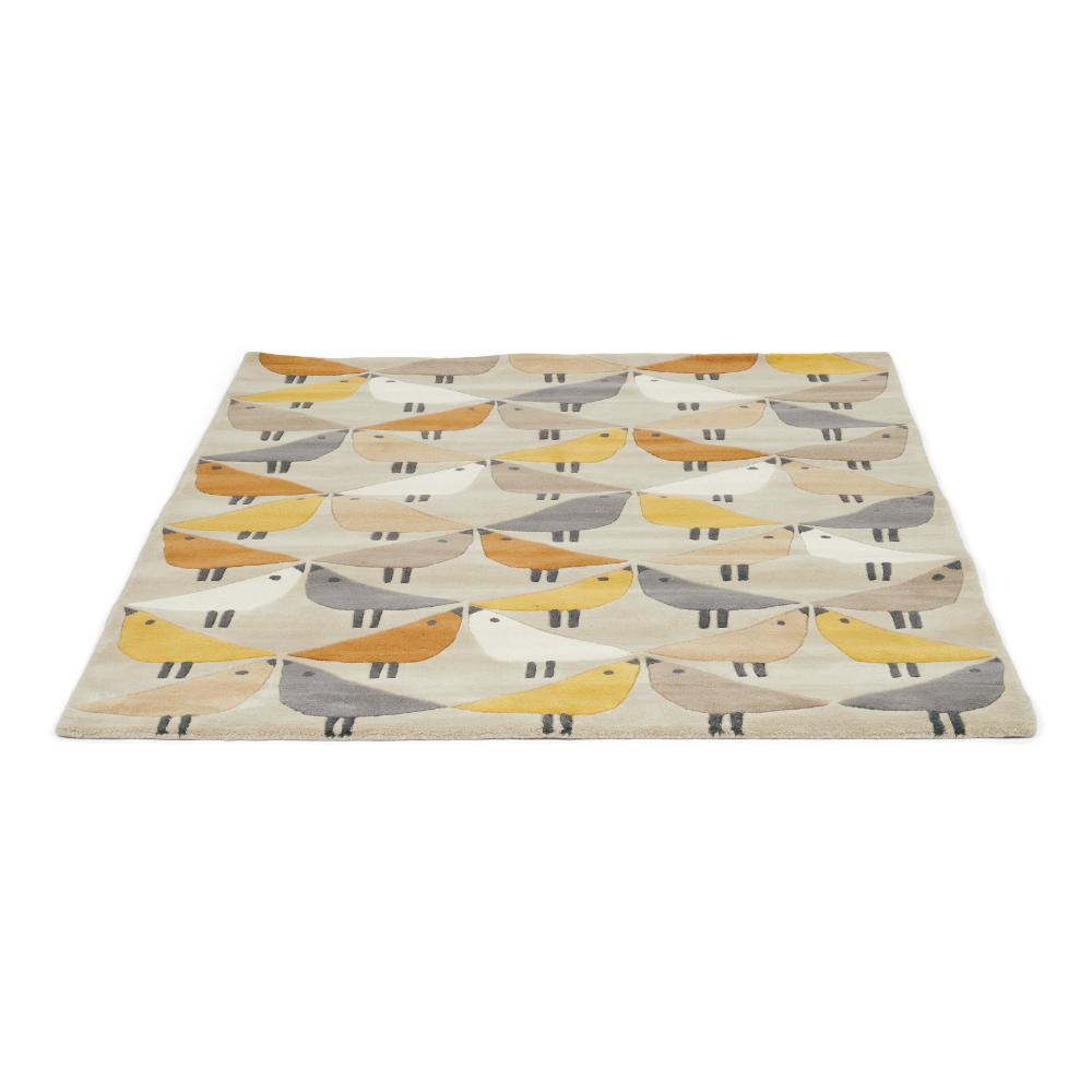 yellow and grey geo bird print wool rug angled image - MyHouse